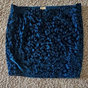 Mudd Skirt Size Large Velour material with cheetah print design in teal.